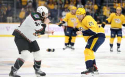 NASHVILLE, TENNESSEE – NOVEMBER 13: Mathieu Olivier #25 of the Nashville Predators fights with Liam O’Brien #38 of the Arizona Coyotes in the first period at Bridgestone Arena on November 13, 2021 in Nashville, Tennessee. (Photo by Donald Page/Getty Images)