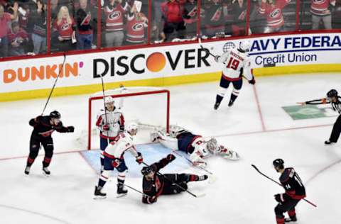 RALEIGH, NORTH CAROLINA – APRIL 22: Jordan Staal #11 of the Carolina Hurricanes celebrates with teammates after scoring a goal against Braden Holtby #70 of the Washington Capitals in the third period of Game Six of the Eastern Conference First Round during the 2019 NHL Stanley Cup Playoffs at PNC Arena on April 22, 2019 in Raleigh, North Carolina. The Hurricanes won 5-2. (Photo by Grant Halverson/Getty Images)