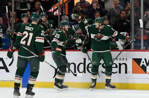 ST PAUL, MINNESOTA – DECEMBER 12: Marcus Foligno #17 of The Minnesota Wild celebrates his goal with teammates against the Edmonton Oilers during the second period of the game at Xcel Energy Center on December 12, 2019, in St Paul, Minnesota. (Photo by Hannah Foslien/Getty Images)