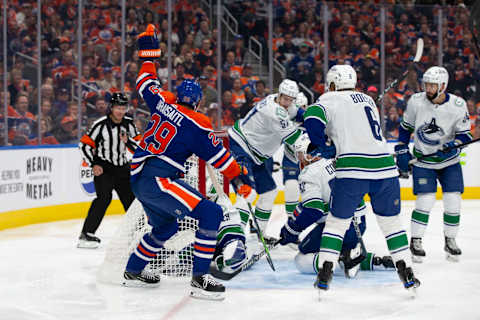 EDMONTON, CANADA – OCTOBER 14: Leon Draisaitl #29 of the Edmonton Oilers celebrates a goal against goaltender Casey DeSmith #29 of the Vancouver Canucks during the first period at Rogers Place on October 14, 2023 in Edmonton, Canada. (Photo by Codie McLachlan/Getty Images)