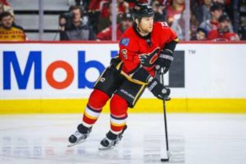 Dec 31, 2015; Calgary, Alberta, CAN; Calgary Flames defenseman Dennis Wideman (6) controls the puck against the Los Angeles Kings during the third period at Scotiabank Saddledome. Los Angeles Kings won 4-1. Mandatory Credit: Sergei Belski-USA TODAY Sports