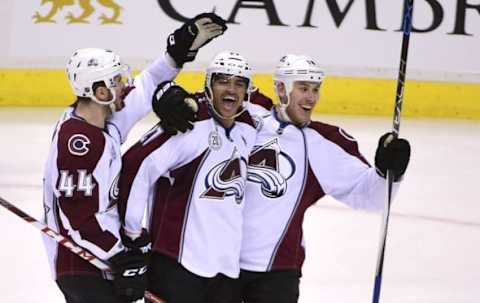 Mar 16, 2016; Vancouver, British Columbia, CAN; Colorado Avalanche forward Andreas Martinsen (27) celebrates his goal against Vancouver Canucks goaltender Ryan Miller (not pictured) during the third period at Rogers Arena. The Colorado Avalanche won 3-1. Mandatory Credit: Anne-Marie Sorvin-USA TODAY Sports