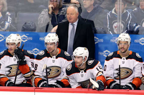 WINNIPEG, MB – MARCH 23: Head Coach Randy Carlyle of the Anaheim Ducks looks on from the bench during second-period action against the Winnipeg Jets on March 23, 2018. (Photo by Jonathan Kozub/NHLI via Getty Images)