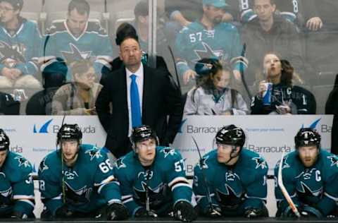 NHL Power Rankings: San Jose Sharks head coach Pter DeBoer watches a replay during the game against the Calgary Flames in the third period at SAP Center at San Jose. The Sharks won 4-1. Mandatory Credit: John Hefti-USA TODAY Sports