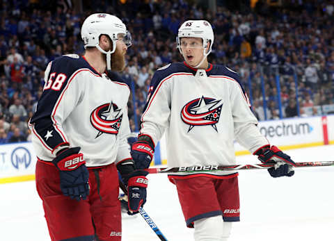 Apr 10, 2019; Tampa, FL, USA; Columbus Blue Jackets defenseman Markus Nutivaara (65), defenseman David Savard (58) during the third period of game one of the first round of the 2019 Stanley Cup Playoffs at Amalie Arena. Mandatory Credit: Kim Klement-USA TODAY Sports