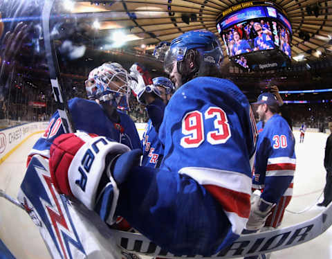 NEW YORK, NEW YORK – MARCH 05: Alexandar Georgiev #40 and Mika Zibanejad #93 of the New York Rangers celebrate a 5-4 overtime victory over the Washington Capitals at Madison Square Garden on March 05, 2020 in New York City. (Photo by Bruce Bennett/Getty Images)