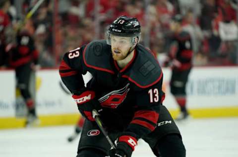 RALEIGH, NC – MAY 03: Warren Foegele #13 of the Carolina Hurricanes skate for position on the ice in Game Four of the Eastern Conference Second Round against the New York Islanders during the 2019 NHL Stanley Cup Playoffs on May 3, 2019 at PNC Arena in Raleigh, North Carolina. (Photo by Gregg Forwerck/NHLI via Getty Images)