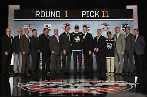 CHICAGO, IL – JUNE 23: (L-R) Scout Chris Byrne, scout Brent McEwen, scout Jussi Kari-Koskinen, scout Bryan Denney, head European scout Christian Ruutu, director of amateur scouting Mark Yannetti, general manager Rob Blake, 11th overall pick Gabe Vilardi, president Luc Robitaille, scout Tony Gasparini, draft runner, assistant general manager Mike Futa, scout Ted Belisle and scout Denis Fugere of the Los Angeles Kings pose for a photo onstage during Round One of the 2017 NHL Draft at United Center on June 23, 2017 in Chicago, Illinois. (Photo by Dave Sandford/NHLI via Getty Images)