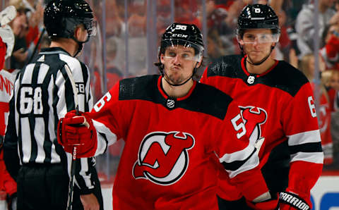 Erik Haula celebrates his empty-netter in the Devils’ home opener. (Photo by Bruce Bennett/Getty Images)