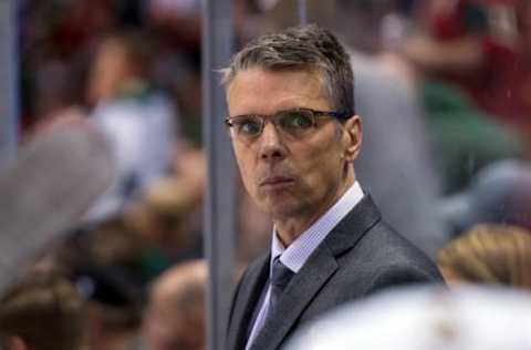 Mar 31, 2016; Saint Paul, MN, USA; Ottawa Senators head coach Dave Cameron in the third period against the Minnesota Wild at Xcel Energy Center. the Ottawa Senators beat the Minnesota Wild 3-2. Mandatory Credit: Brad Rempel-USA TODAY Sports