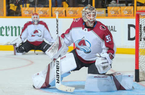 NASHVILLE, TN – APRIL 20: Spencer Martin #30 of the Colorado Avalanche watches teammate Andrew Hammond #35 warms up prior to a game against the Nashville Predators in Game Five of the Western Conference First Round during the 2018 NHL Stanley Cup Playoffs at Bridgestone Arena on April 20, 2018 in Nashville, Tennessee. (Photo by Frederick Breedon/Getty Images)