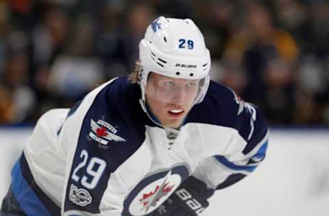 NHL Players: Winnipeg Jets right wing Patrik Laine (29) waits for a face off during the first period against the Buffalo Sabres at KeyBank Center. Mandatory Credit: Timothy T. Ludwig-USA TODAY Sports