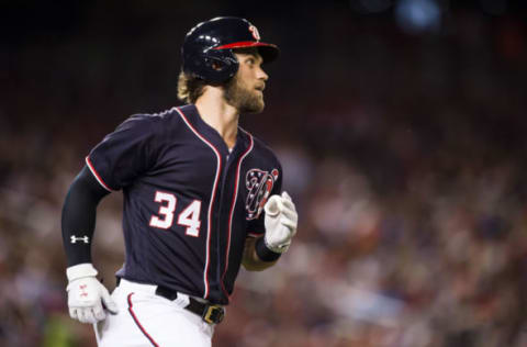 Jun 9, 2017; Washington, DC, USA; Washington Nationals right fielder Bryce Harper (34) reacts after hitting a fly ball out to center in the sixth inning against the Texas Rangers at Nationals Park. Mandatory Credit: Patrick McDermott-USA TODAY Sports