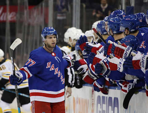 NEW YORK, NEW YORK – FEBRUARY 06: Tony DeAngelo #77 of the New York Rangers celebrates his shoot-out game winning goal against the Boston Bruins at Madison Square Garden on February 06, 2019 in New York City. The Rangers defeated the Bruins 4-3 in the shoot-out. (Photo by Bruce Bennett/Getty Images)