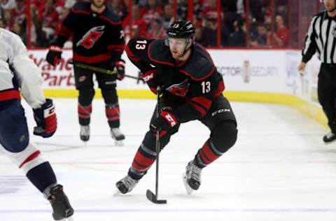 RALEIGH, NC – APRIL 15: Warren Foegele #13 of the Carolina Hurricanes controls the puck near the blue line against of the Washington Capitals in Game Three of the Eastern Conference First Round during the 2019 NHL Stanley Cup Playoffs on April 15, 2019 at PNC Arena in Raleigh, North Carolina. (Photo by Gregg Forwerck/NHLI via Getty Images)