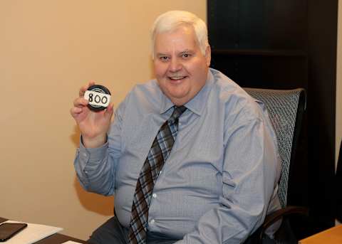 DALLAS, TX – DECEMBER 21: Ken Hitchcock, head coach of the Dallas Stars holds up a puck after his 800th career victory against the Chicago Blackhawks at the American Airlines Center on December 21, 2017 in Dallas, Texas. (Photo by Glenn James/NHLI via Getty Images)