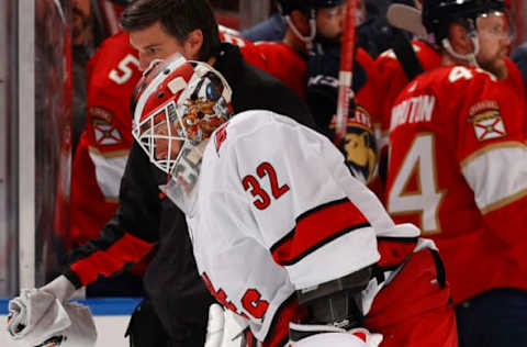 SUNRISE, FL – NOVEMBER 6: Goaltender Antti Raanta #32 of the Carolina Hurricanes is assisted off the ice after being injured in a collision against the Florida Panthers at the FLA Live Arena on November 6, 2021, in Sunrise, Florida. (Photo by Joel Auerbach/Getty Images)