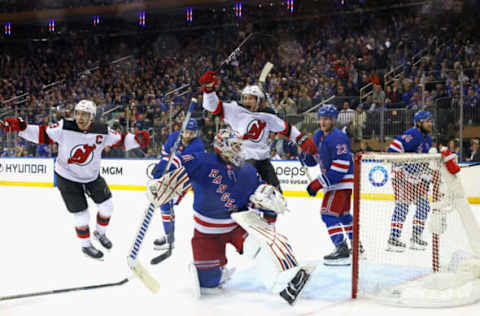 NEW YORK, NEW YORK – APRIL 22: (L-R) Nico Hischier #13 and Dawson Mercer #91 of the New Jersey Devils celebrate an overtime victory against Igor Shesterkin #31 and the New York Rangers during Game Three in the First Round of the 2023 Stanley Cup Playoffs at Madison Square Garden on April 22, 2023, in New York, New York. (Photo by Bruce Bennett/Getty Images)