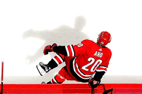 RALEIGH, NC – OCTOBER 27: Sebastian Aho #20 of the Carolina Hurricanes leaps over the boards to enter the ice against the St. Louis Blues during an NHL game on October 27, 2017 at PNC Arena in Raleigh, North Carolina. (Photo by Gregg Forwerck/NHLI via Getty Images)