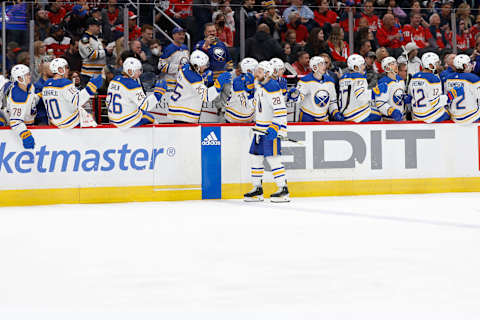 Mar 15, 2023; Washington, District of Columbia, USA; Buffalo Sabres left wing Zemgus Girgensons (28) celebrates with teammates after scoring a goal against the Washington Capitals in the third period at Capital One Arena. Mandatory Credit: Geoff Burke-USA TODAY Sports