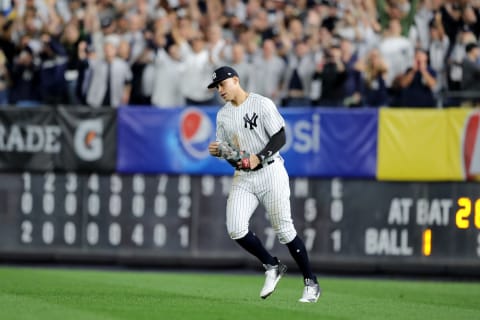 NEW YORK, NEW YORK – OCTOBER 03: Aaron Judge #99 of the New York Yankees celebrates after defeating the Oakland Athletics in the American League Wild Card Game at Yankee Stadium on October 03, 2018 in the Bronx borough of New York City. (Photo by Elsa/Getty Images)