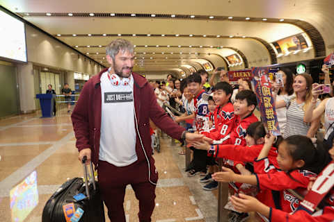 BEIJING, CHINA – AUGUST 04: Alex Ovechkin shakes hand with fans at Beijing airport on August 04, 2019 in Beijing, China. (Photo by Emmanuel Wong/NHLI via Getty Images)