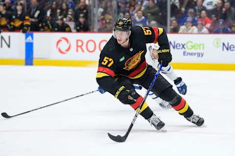 Tyler Myers #57 of the Vancouver Canucks skates with the puck during the third period of their NHL game against the Toronto Maple Leafs at Rogers Arena on March 4, 2023 in Vancouver, British Columbia, Canada. (Photo by Derek Cain/Getty Images)