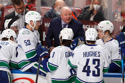 SUNRISE, FL – JANUARY 11: Head Coach Bruce Boudreau of the Vancouver Canucks directs the players during a time out in the second period against the Florida Panthers at the FLA Live Arena on January 11, 2022 in Sunrise, Florida. (Photo by Joel Auerbach/Getty Images)