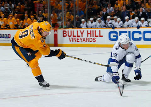 NASHVILLE, TENNESSEE – NOVEMBER 19: Filip Forsberg #9 of the Nashville Predators takes a shot past Slater Koekkoek #29 of the Tampa Bay Lightning during the third period at Bridgestone Arena on November 19, 2018 in Nashville, Tennessee. (Photo by Frederick Breedon/Getty Images)