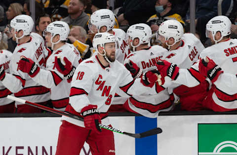 BOSTON, MA – JANUARY 18: Derek Stepan #18 of the Carolina Hurricanes celebrates his goal against the Boston Bruins with his teammates during the first period at the TD Garden on January 18, 2022 in Boston, Massachusetts. (Photo by Rich Gagnon/Getty Images)