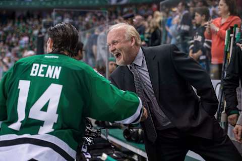 Apr 11, 2014; Dallas, TX, USA; Dallas Stars left wing Jamie Benn (14) and head coach Lindy Ruff celebrate the win over the St. Louis Blues at the American Airlines Center. The Stars shut out the Blues 3-0 and clinched the final playoff spot in the western conference. Mandatory Credit: Jerome Miron-USA TODAY Sports