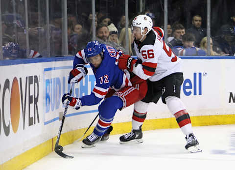 NEW YORK, NEW YORK – APRIL 29: Erik Haula #56 of the New Jersey Devils keeps tabs on Filip Chytil #72 of the New York Rangers during the first period in Game Six of the First Round of the 2023 Stanley Cup Playoffs at Madison Square Garden on April 29, 2023 in New York, New York. (Photo by Bruce Bennett/Getty Images)