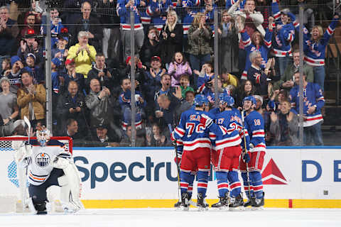 NEW YORK, NY – NOVEMBER 11: Members of the New York Rangers celebrate after a goal by Rick Nash