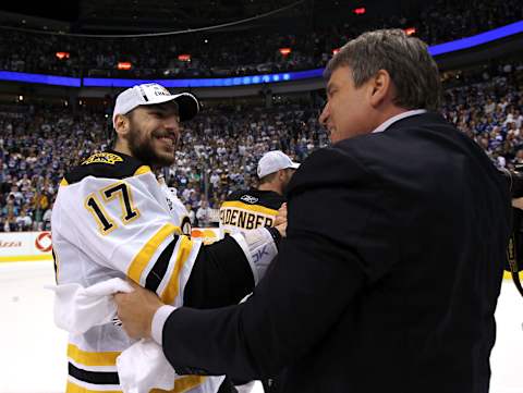 Boston Bruins president Cam Neely (R). (Photo by Bruce Bennett/Getty Images)