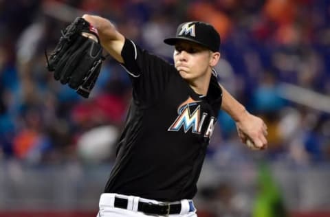 Jul 27, 2016; Miami, FL, USA; Miami Marlins starting pitcher Adam Conley (61) delivers a pitch during the sixth inning against the Philadelphia Phillies at Marlins Park. The Marlins won 11-1. Mandatory Credit: Steve Mitchell-USA TODAY Sports