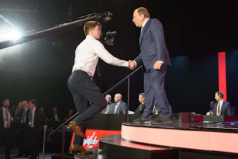 VANCOUVER, BC – JUNE 21: Connor McMichael shakes hands with NHL Commissioner Gary Bettman after being picked twenty-five overall by the Washington Capitals during the first round of the 2019 NHL Draft at Rogers Arena on June 21, 2019 in Vancouver, British Columbia, Canada. (Photo by Derek Cain/Icon Sportswire via Getty Images)