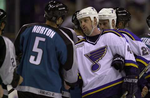 Scott Young #48, St. Louis Blues, Jeff Norton #5, San Jose Sharks (DIGITAL IMAGE. Mandatory Credit: Elsa/ALLSPORT)