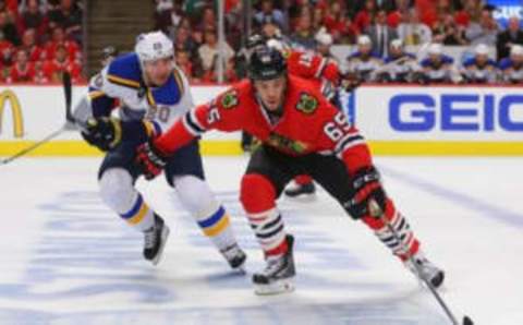 Apr 23, 2016; Chicago, IL, USA; Chicago Blackhawks center Andrew Shaw (65) is pursued by St. Louis Blues left wing Alexander Steen (20) during the first period in game six of the first round of the 2016 Stanley Cup Playoffs at the United Center. Mandatory Credit: Dennis Wierzbicki-USA TODAY Sports