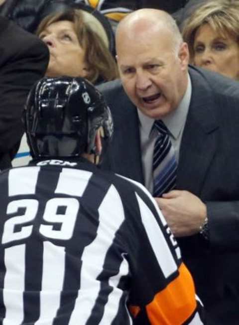 Dec 18, 2015; Pittsburgh, PA, USA; Boston Bruins head coach Claude Julien (R) talks to referee Ian Walsh (29) against the Pittsburgh Penguins during the third period at the CONSOL Energy Center. The Bruins won 6-2. Mandatory Credit: Charles LeClaire-USA TODAY Sports