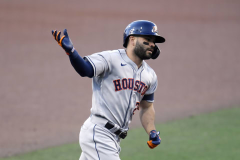 Jose Altuve #27 of the Houston Astros celebrates after hitting a solo home run against the Tampa Bay Rays during the first inning in game one of the American League Championship Series at PETCO Park on October 11, 2020 in San Diego, California. (Photo by Harry How/Getty Images)