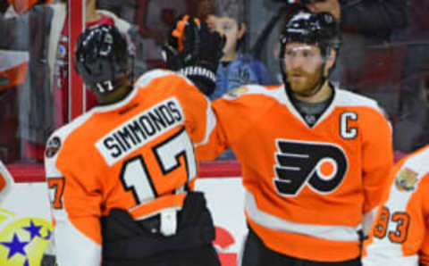 Nov 17, 2016; Philadelphia, PA, USA; Philadelphia Flyers center Claude Giroux (28) celebrates with right wing Wayne Simmonds (17) after winning against the Winnipeg Jets at Wells Fargo Center. The Flyers defeated the Jets, 5-2. Mandatory Credit: Eric Hartline-USA TODAY Sports