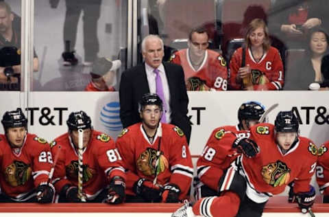 NHL Power Rankings: Chicago Blackhawks head coach Joel Quenneville (C) watches from behind the bench against Philadelphia Flyers from the bench during the first period at the United Center. Mandatory Credit: David Banks-USA TODAY Sports