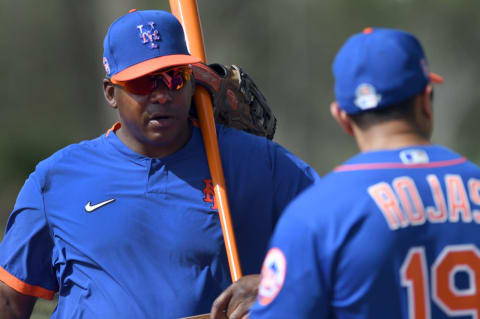 Feb 12, 2020; Port St. Lucie, Florida, USA; New York Mets bench coach Hensley Meulens (left) talks with manager Luis Rojas during the morning spring training workout. Mandatory Credit: Jim Rassol-USA TODAY Sports