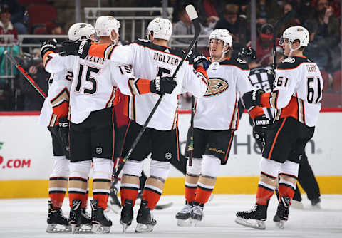 GLENDALE, ARIZONA – NOVEMBER 27: (L-R) Brendan Guhle #2, Ryan Getzlaf #15, Korbinian Holzer #5, Rickard Rakell #67 and Troy Terry #61 of the Anaheim Ducks celebrate after Guhle scored a goal against the Arizona Coyotes during the first period of the NHL game at Gila River Arena on November 27, 2019 in Glendale, Arizona. (Photo by Christian Petersen/Getty Images)