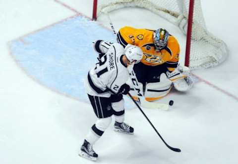 Feb 20, 2016; Nashville, TN, USA; Nashville Predators goalie Pekka Rinne (35) makes a save on a shot by Los Angeles Kings center Nick Shore (21) during the third period at Bridgestone Arena. The Kings won 2-1 in overtime. Mandatory Credit: Christopher Hanewinckel-USA TODAY Sports