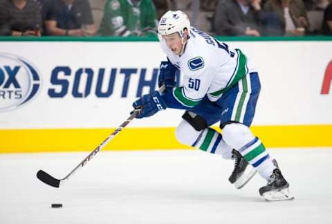 Oct 29, 2015; Dallas, TX, USA; Vancouver Canucks center Brendan Gaunce (50) skates against the Dallas Stars at the American Airlines Center. The Stars defeat the Canucks 4-3 in overtime. Mandatory Credit: Jerome Miron-USA TODAY Sports