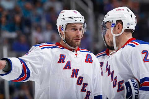 SAN JOSE, CA – MARCH 28: Dan Girardi #5 of the New York Rangers talks with teammates during the game against the San Jose Sharks at SAP Center on March 28, 2017 in San Jose, California. (Photo by Rocky W. Widner/NHL/Getty Images)