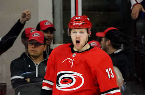 RALEIGH, NC – JANUARY 7: Warren Foegele #13 of the Carolina Hurricanes scores a goal and celebrates during an NHL game against the Philadelphia Flyers on January 7, 2020 at PNC Arena in Raleigh, North Carolina. (Photo by Gregg Forwerck/NHLI via Getty Images)