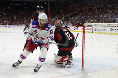 RALEIGH, NORTH CAROLINA – MAY 20: Tyler Motte #64 of the New York Rangers skates against the Carolina Hurricanes in Game Two of the Second Round of the 2022 Stanley Cup Playoffs at PNC Arena on May 20, 2022, in Raleigh, North Carolina. The Hurricanes shut out the Rangers 2-0. (Photo by Bruce Bennett/Getty Images)