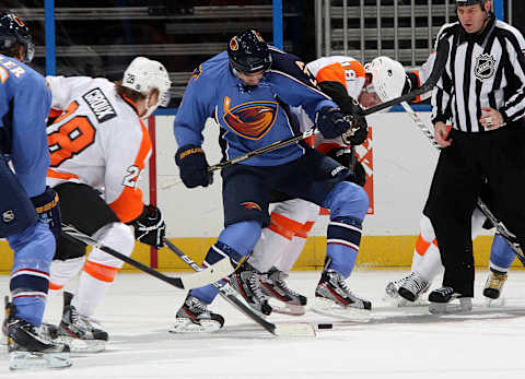 ATLANTA – MARCH 17: Evander Kane #9 of the Atlanta Thrashers battles for the puck against Mike Richards #18 of the Philadelphia Flyers at Philips Arena on March 17, 2011 in Atlanta, Georgia. (Photo by Scott Cunningham/NHLI via Getty Images)